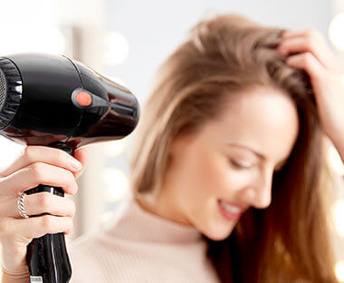 Parlux produkt bliver brugt af en dame